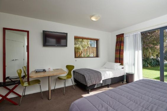 Triple Executive Studio table and single bed